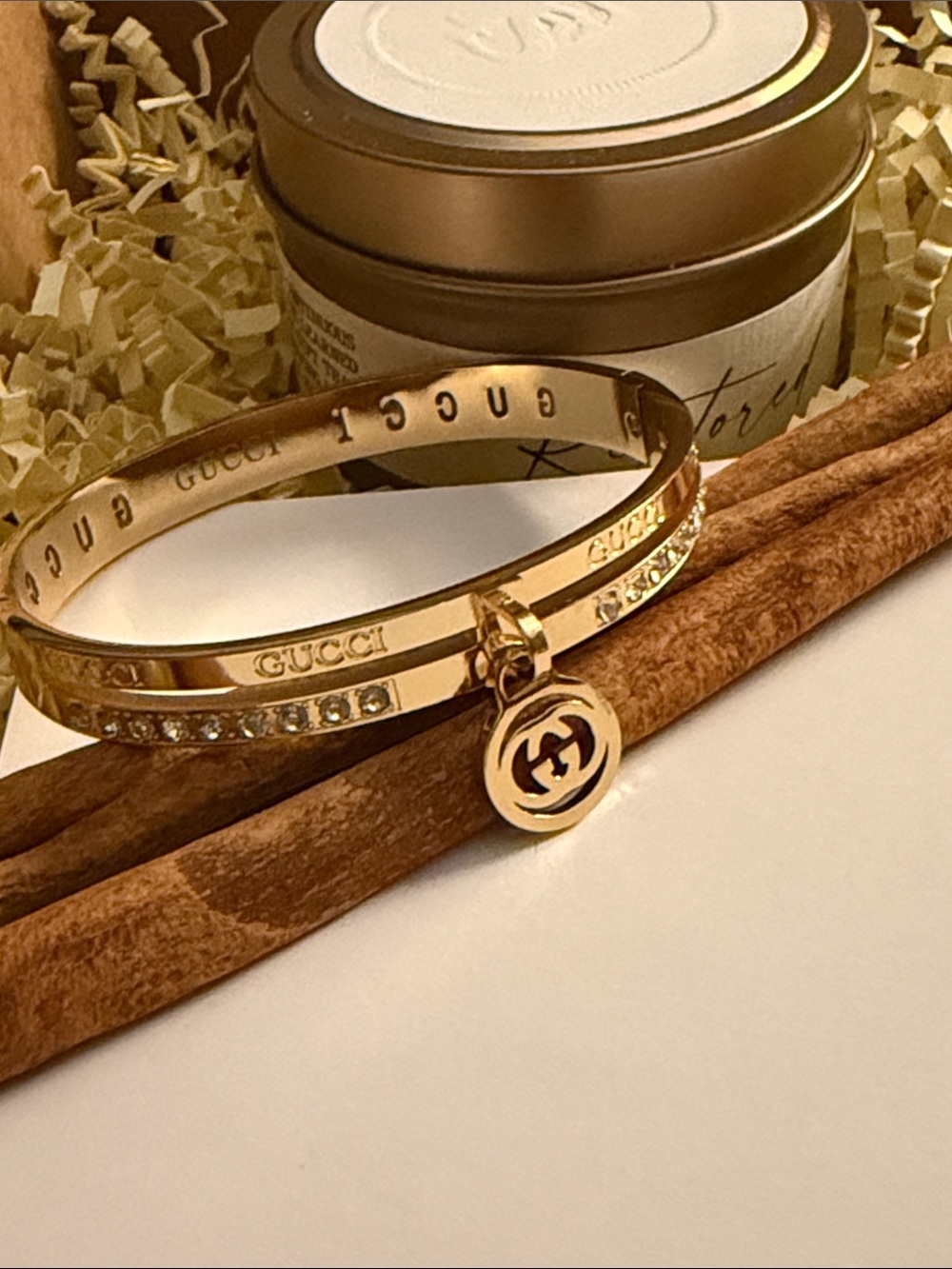Gold-Tone Crystal Logo Charm Bangle